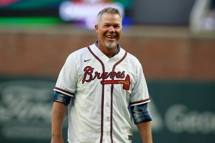 Apr 7, 2022; Atlanta, Georgia, USA; Former Atlanta Braves third baseman Chipper Jones throws out the ceremonial first pitch before the game on Opening Day against the Cincinnati Reds at Truist Park. Mandatory Credit: Brett Davis-USA TODAY Sports